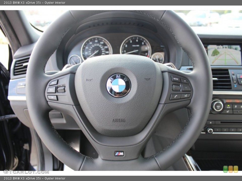 Oyster Interior Steering Wheel for the 2013 BMW X3 xDrive 35i #79124854