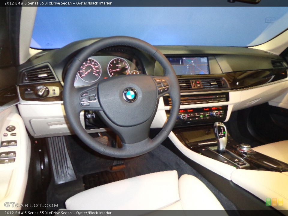 Oyster/Black Interior Prime Interior for the 2012 BMW 5 Series 550i xDrive Sedan #79127073