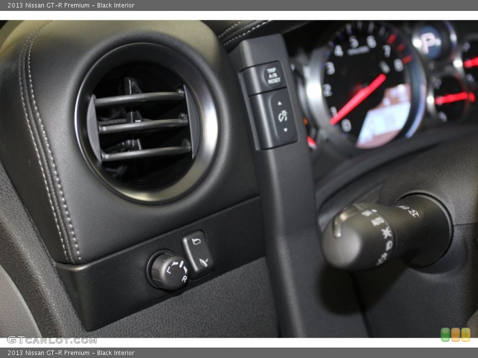 Black Interior Controls for the 2013 Nissan GT-R Premium #79141296