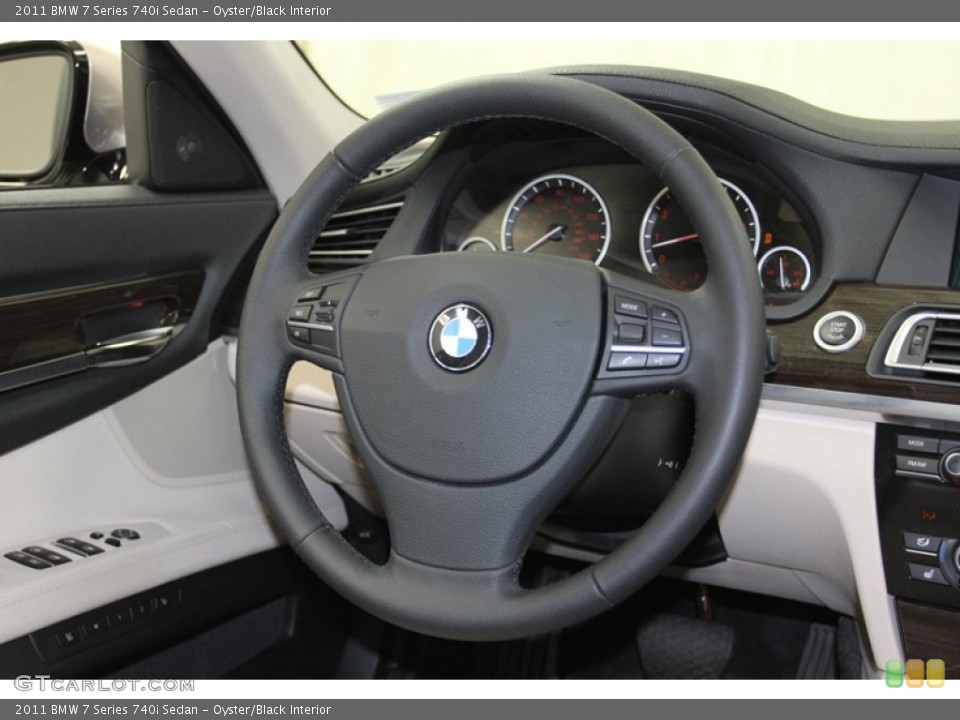 Oyster/Black Interior Steering Wheel for the 2011 BMW 7 Series 740i Sedan #79146243