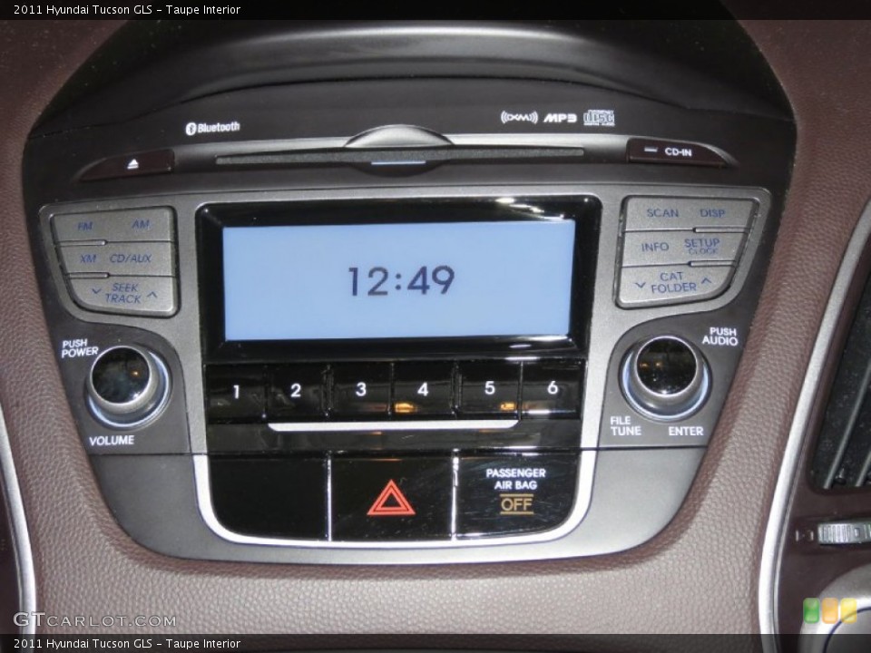Taupe Interior Controls for the 2011 Hyundai Tucson GLS #79163274