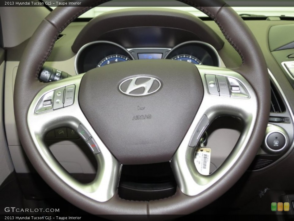 Taupe Interior Steering Wheel for the 2013 Hyundai Tucson GLS #79215145