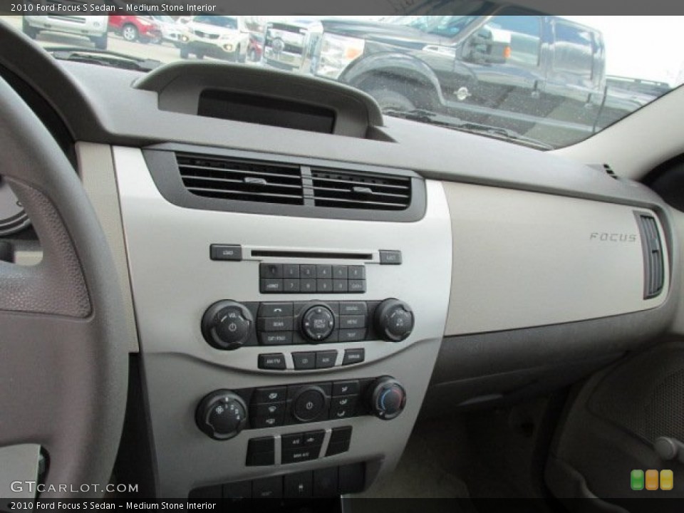Medium Stone Interior Controls for the 2010 Ford Focus S Sedan #79228141