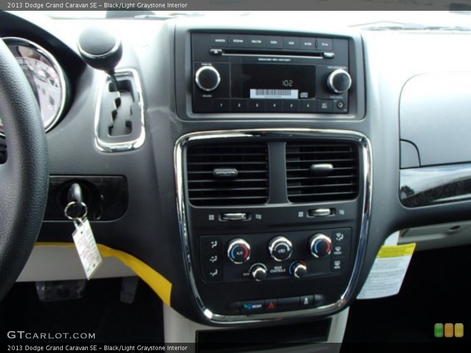 Black/Light Graystone Interior Controls for the 2013 Dodge Grand Caravan SE #79233946