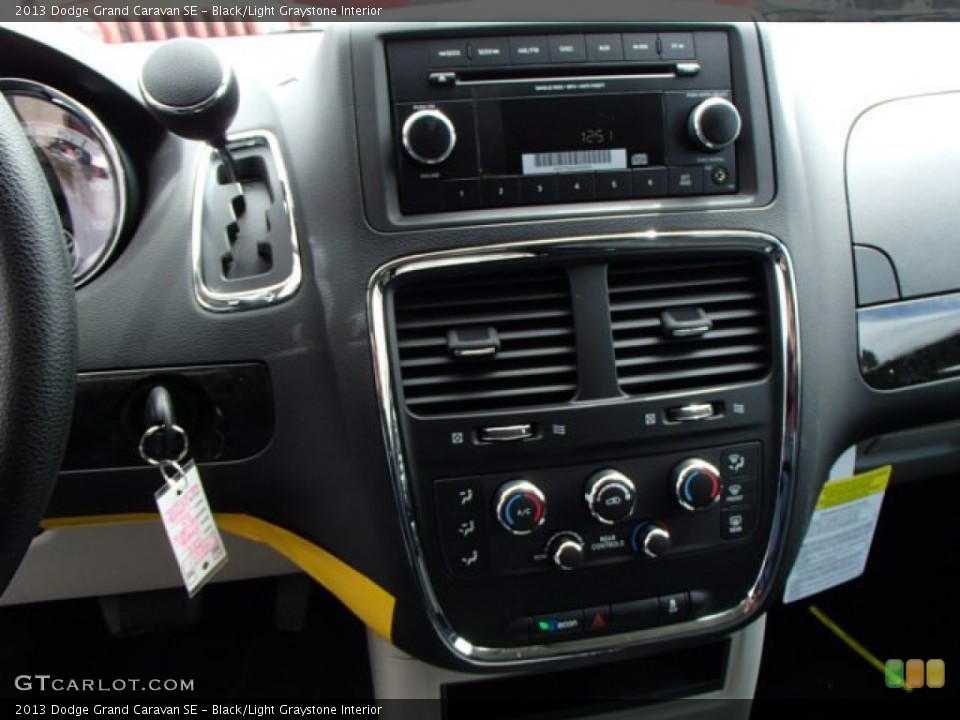 Black/Light Graystone Interior Controls for the 2013 Dodge Grand Caravan SE #79234333