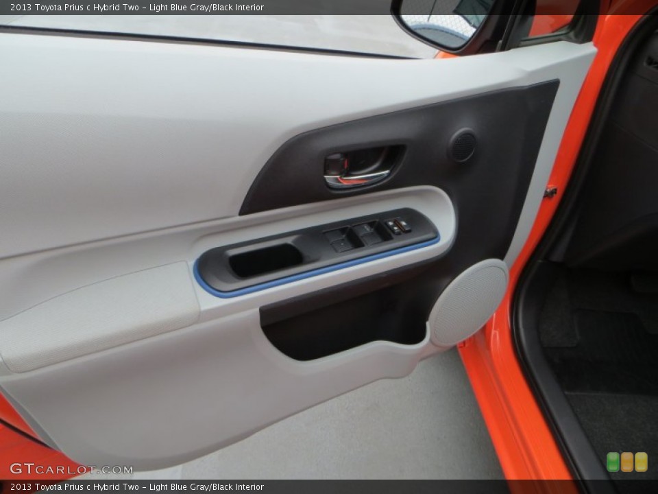 Light Blue Gray/Black Interior Door Panel for the 2013 Toyota Prius c Hybrid Two #79265108