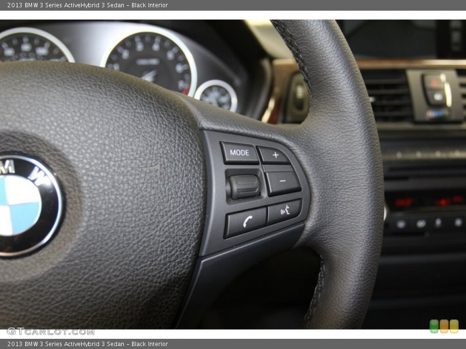 Black Interior Controls for the 2013 BMW 3 Series ActiveHybrid 3 Sedan #79274336