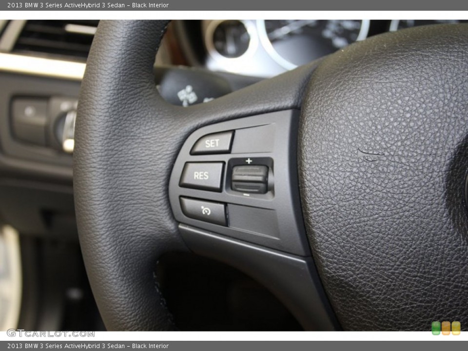 Black Interior Controls for the 2013 BMW 3 Series ActiveHybrid 3 Sedan #79274362