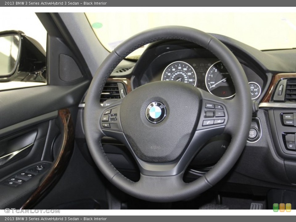 Black Interior Steering Wheel for the 2013 BMW 3 Series ActiveHybrid 3 Sedan #79274423