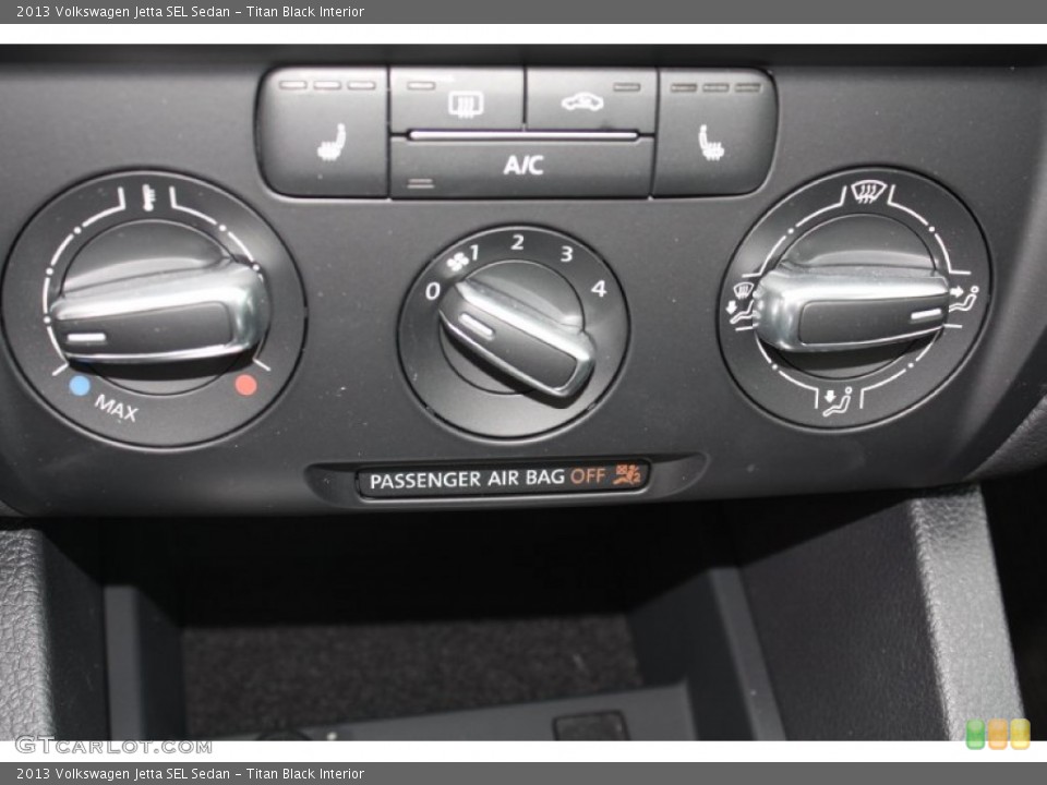 Titan Black Interior Controls for the 2013 Volkswagen Jetta SEL Sedan #79285122