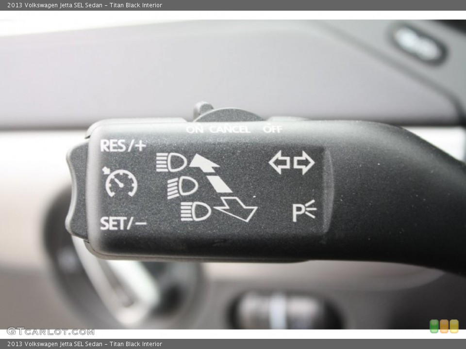 Titan Black Interior Controls for the 2013 Volkswagen Jetta SEL Sedan #79285207