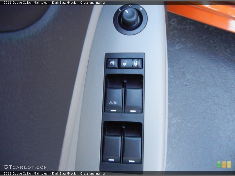 Dark Slate/Medium Graystone Interior Controls for the 2011 Dodge Caliber Mainstreet #79309643