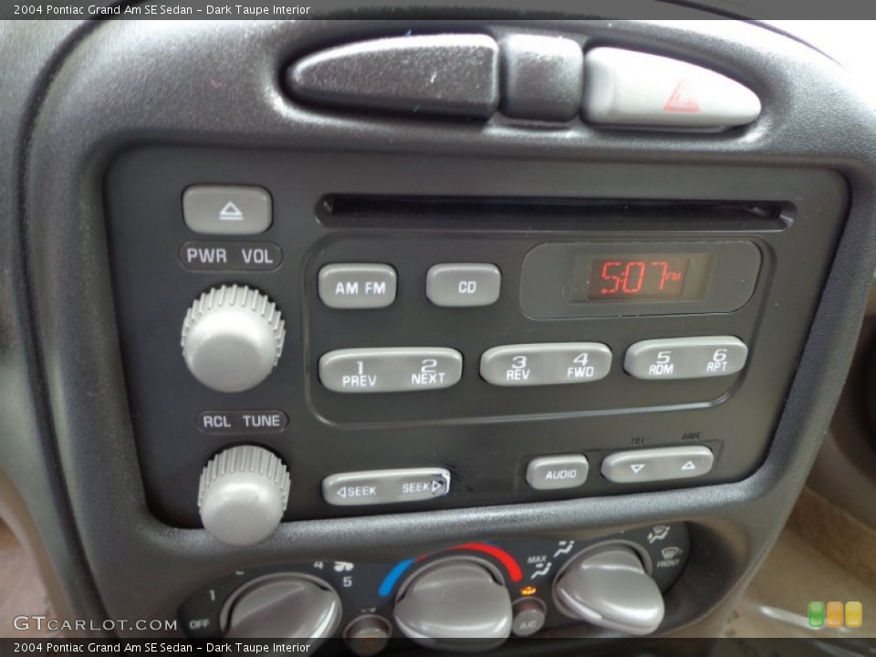 Dark Taupe Interior Controls for the 2004 Pontiac Grand Am SE Sedan #79309838