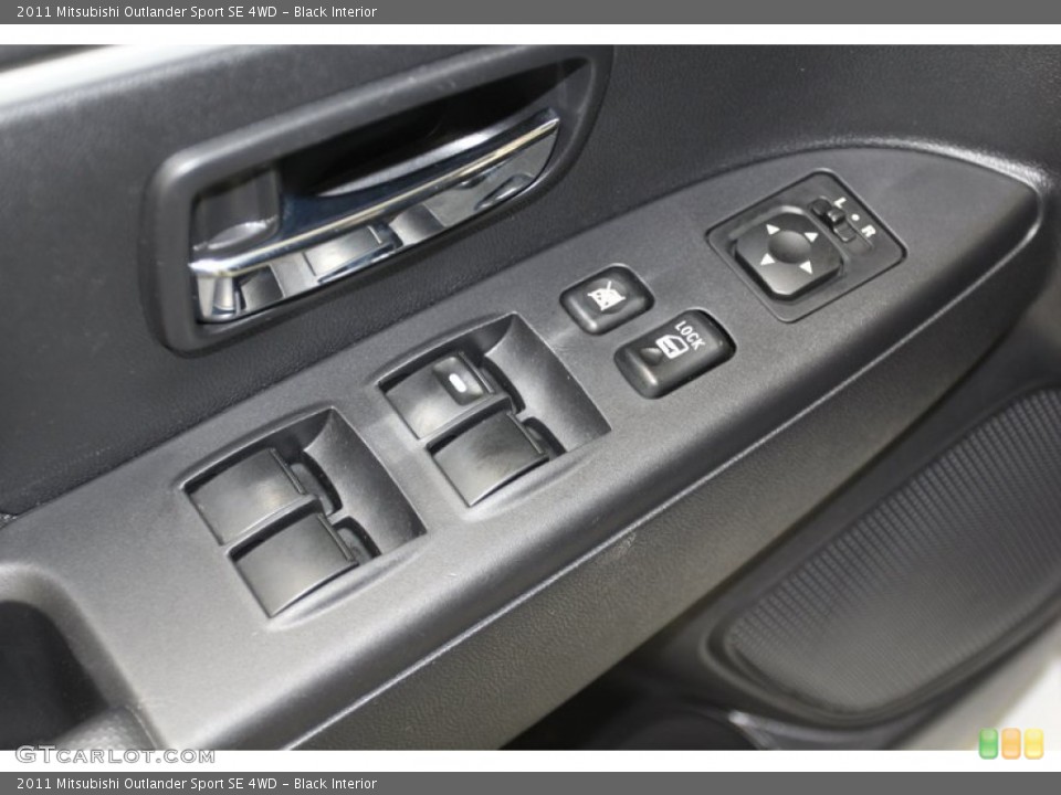 Black Interior Controls for the 2011 Mitsubishi Outlander Sport SE 4WD #79313657
