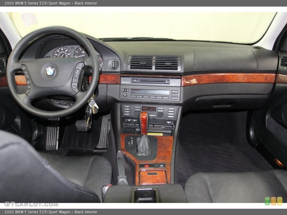 Black Interior Dashboard for the 2003 BMW 5 Series 525i Sport Wagon #79317676