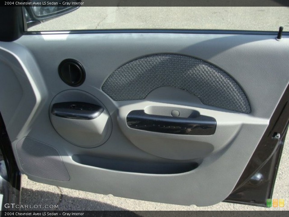 Gray Interior Door Panel for the 2004 Chevrolet Aveo LS Sedan #79345305