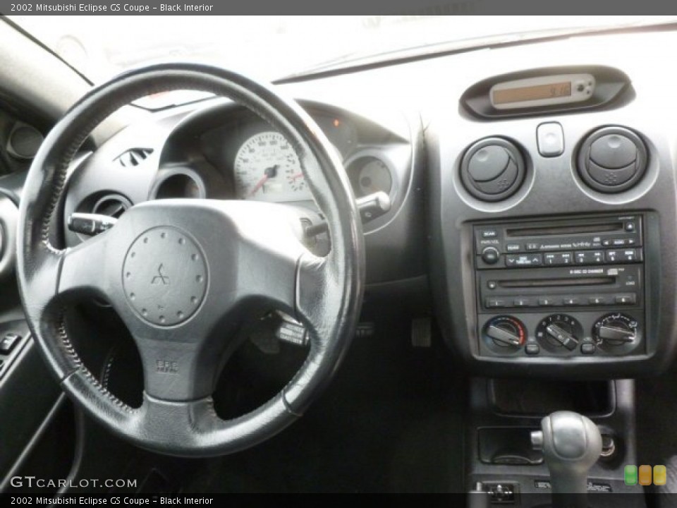 Black Interior Dashboard for the 2002 Mitsubishi Eclipse GS Coupe #79361632