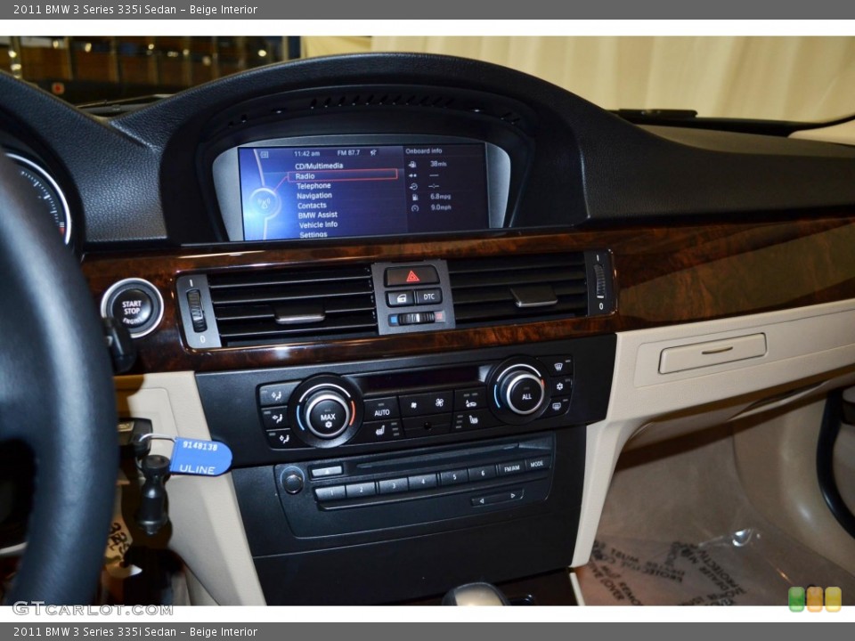 Beige Interior Controls for the 2011 BMW 3 Series 335i Sedan #79364548