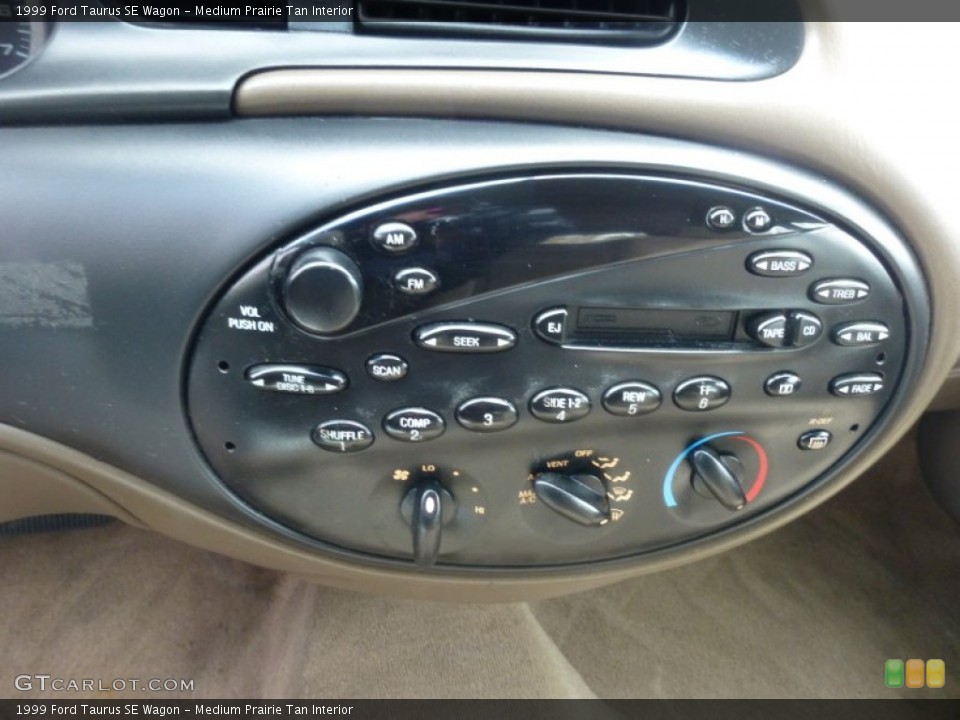Medium Prairie Tan Interior Controls for the 1999 Ford Taurus SE Wagon #79380995