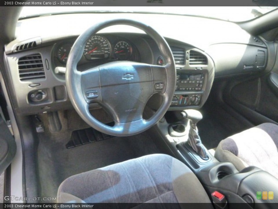Ebony Black Interior Dashboard for the 2003 Chevrolet Monte Carlo LS #79387438