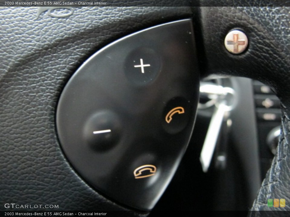 Charcoal Interior Controls for the 2003 Mercedes-Benz E 55 AMG Sedan #79397539