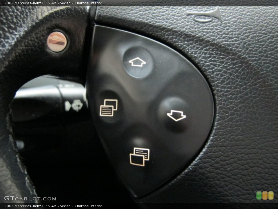 Charcoal Interior Controls for the 2003 Mercedes-Benz E 55 AMG Sedan #79397559