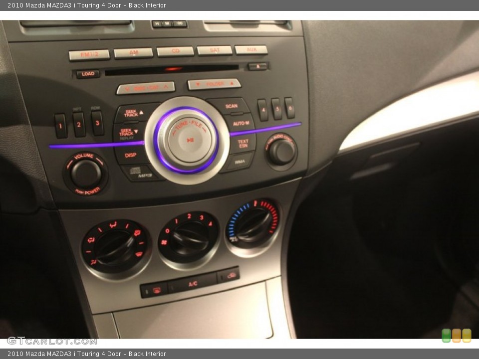 Black Interior Controls for the 2010 Mazda MAZDA3 i Touring 4 Door #79426127