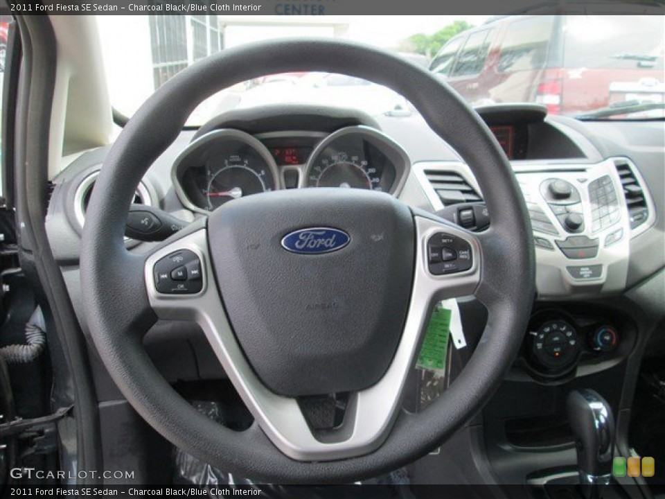 Charcoal Black/Blue Cloth Interior Steering Wheel for the 2011 Ford Fiesta SE Sedan #79435927