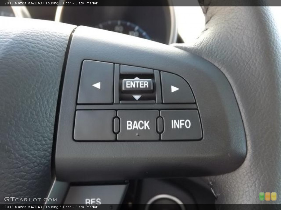 Black Interior Controls for the 2013 Mazda MAZDA3 i Touring 5 Door #79441343