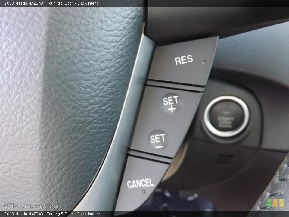 Black Interior Controls for the 2013 Mazda MAZDA3 i Touring 5 Door #79441361