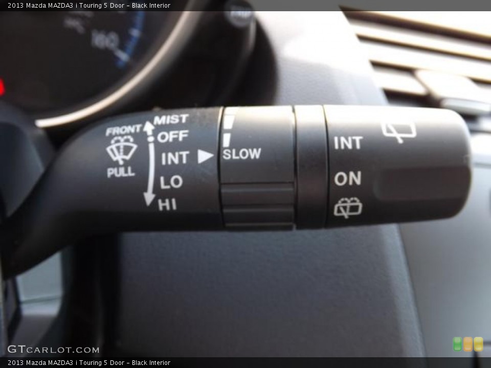 Black Interior Controls for the 2013 Mazda MAZDA3 i Touring 5 Door #79441409