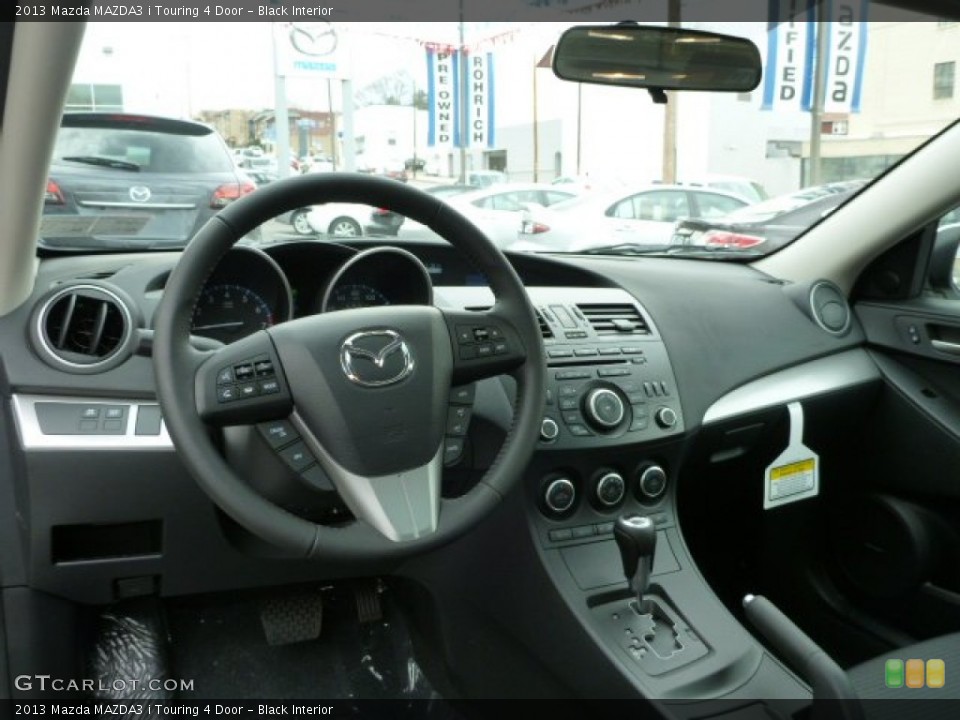 Black Interior Dashboard for the 2013 Mazda MAZDA3 i Touring 4 Door #79481476