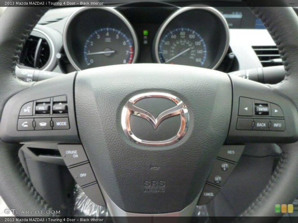 Black Interior Steering Wheel for the 2013 Mazda MAZDA3 i Touring 4 Door #79481609