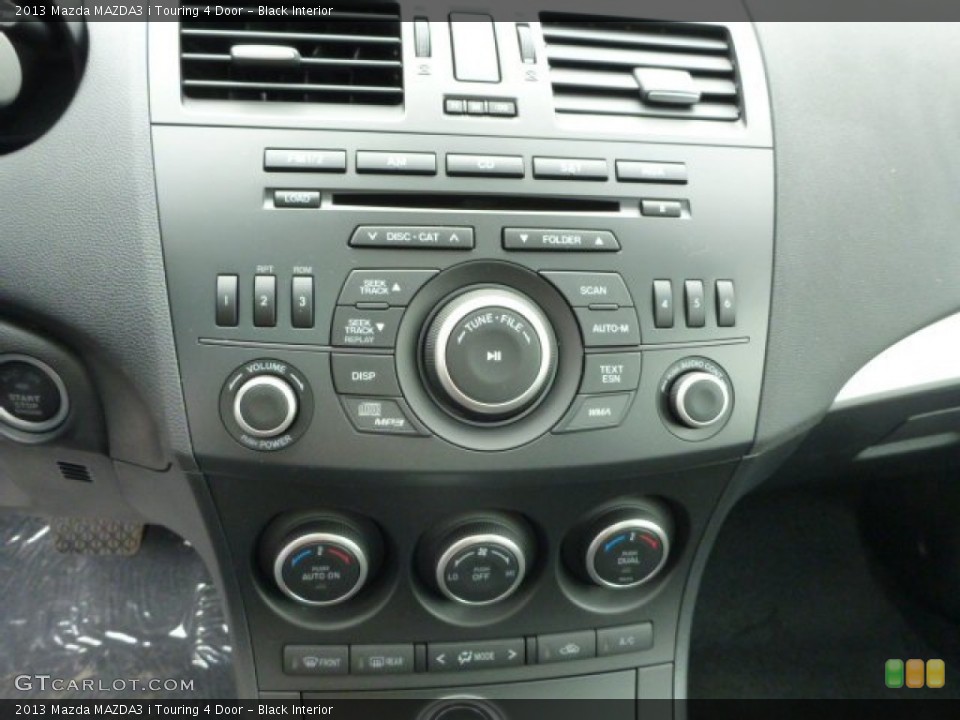 Black Interior Controls for the 2013 Mazda MAZDA3 i Touring 4 Door #79481630