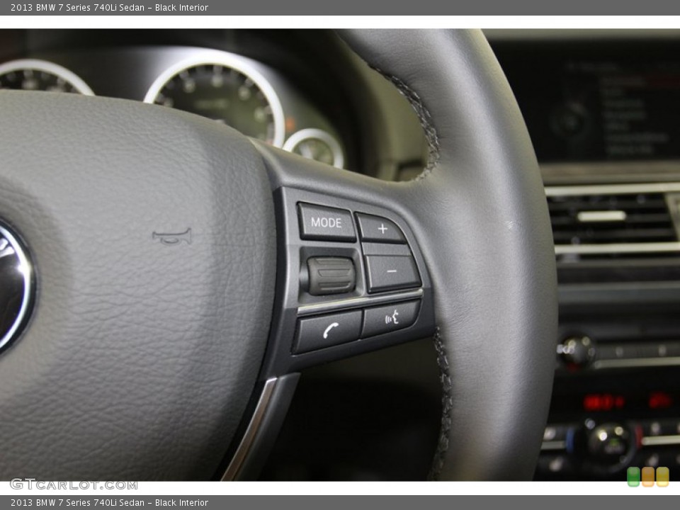 Black Interior Controls for the 2013 BMW 7 Series 740Li Sedan #79493156