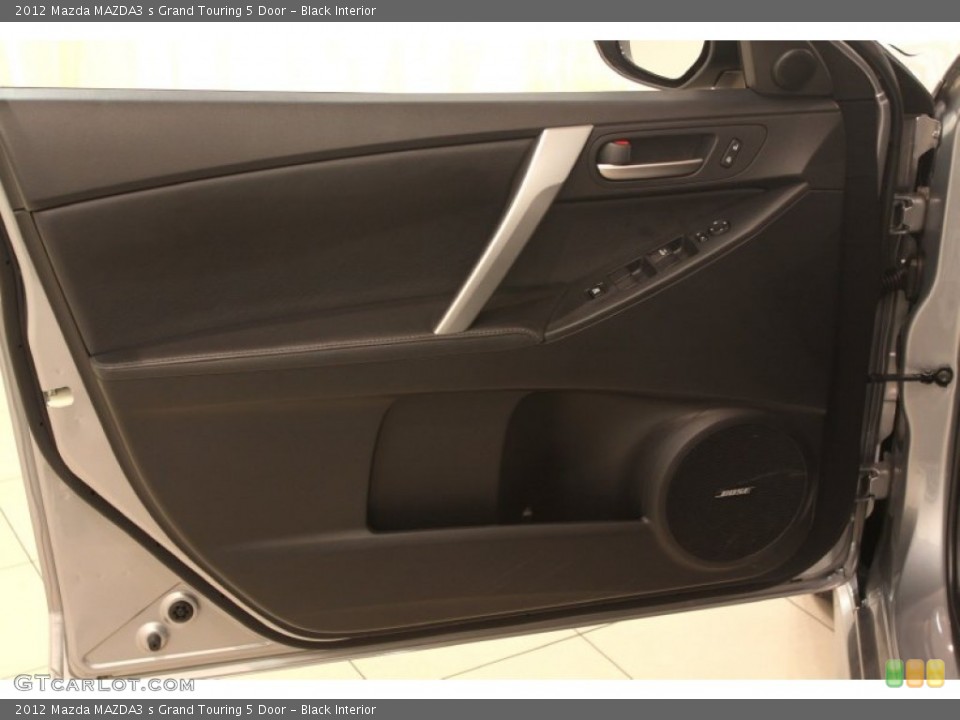 Black Interior Door Panel for the 2012 Mazda MAZDA3 s Grand Touring 5 Door #79529560