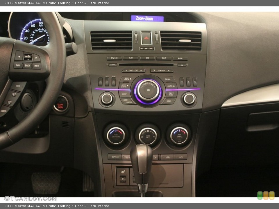Black Interior Controls for the 2012 Mazda MAZDA3 s Grand Touring 5 Door #79529657