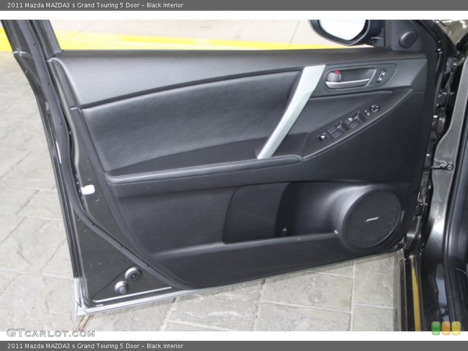 Black Interior Door Panel for the 2011 Mazda MAZDA3 s Grand Touring 5 Door #79537145