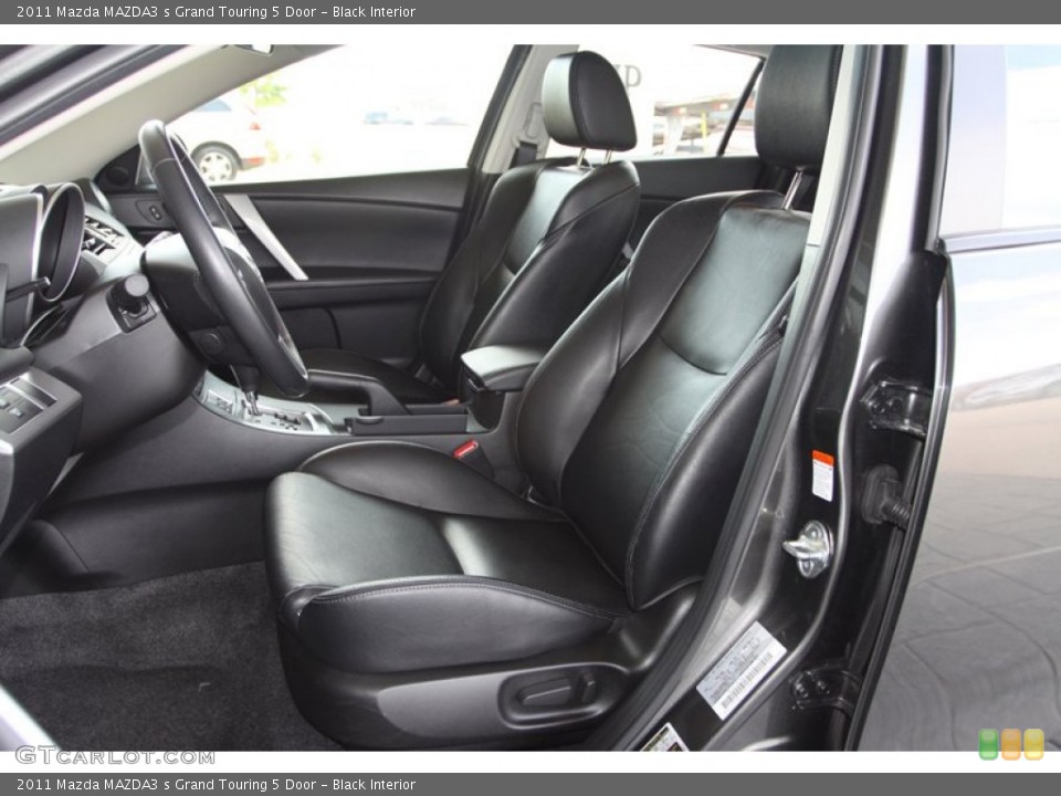 Black Interior Front Seat for the 2011 Mazda MAZDA3 s Grand Touring 5 Door #79537169