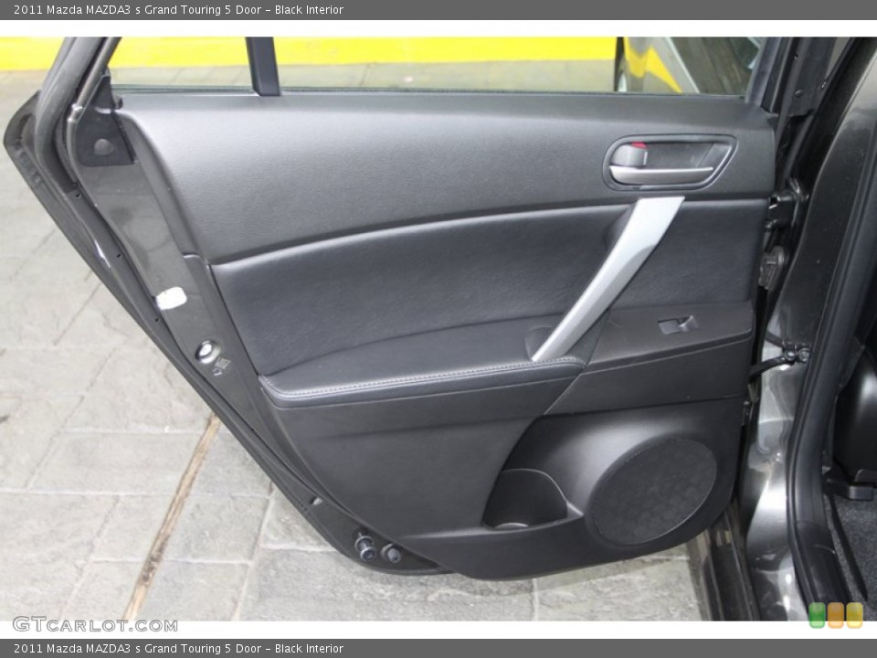 Black Interior Door Panel for the 2011 Mazda MAZDA3 s Grand Touring 5 Door #79537186