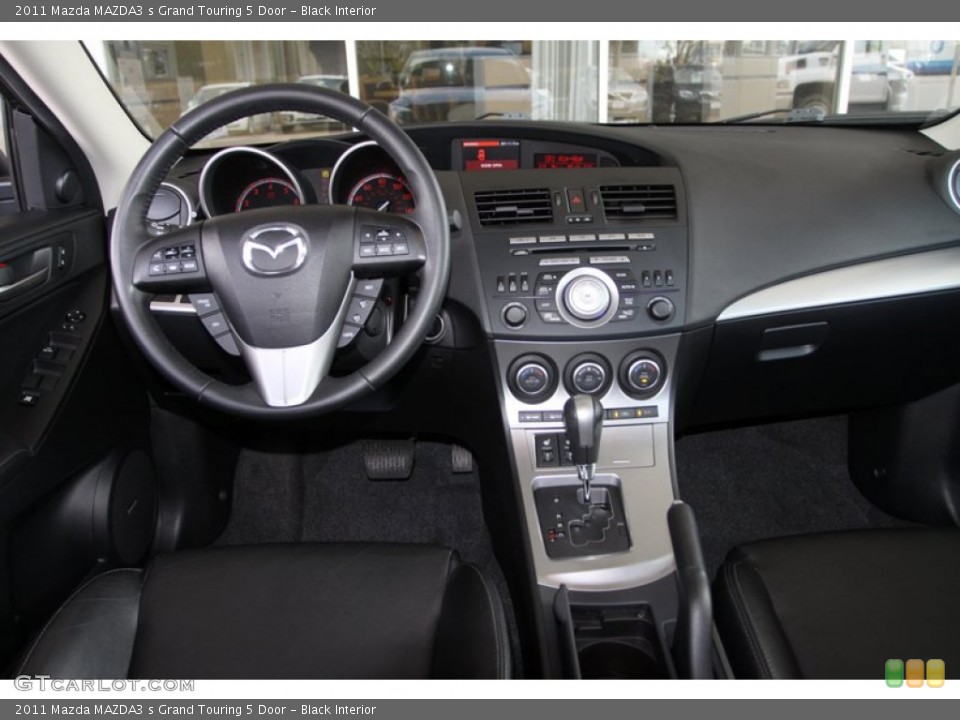 Black Interior Dashboard for the 2011 Mazda MAZDA3 s Grand Touring 5 Door #79537234