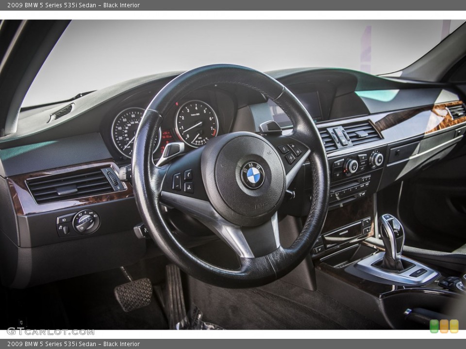 Black Interior Dashboard for the 2009 BMW 5 Series 535i Sedan #79537681