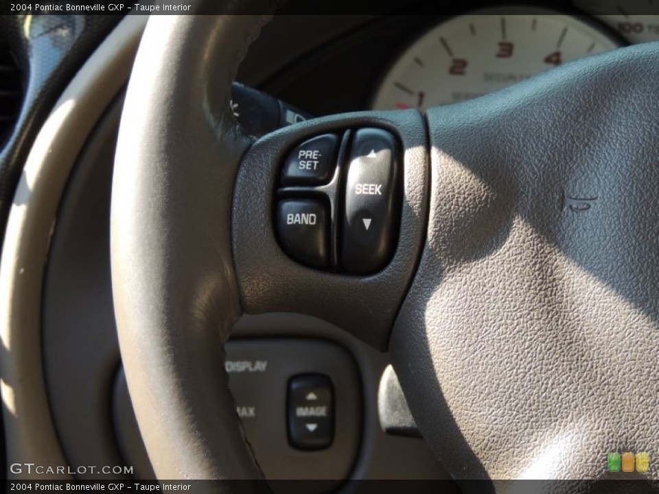 Taupe Interior Controls for the 2004 Pontiac Bonneville GXP #79538349