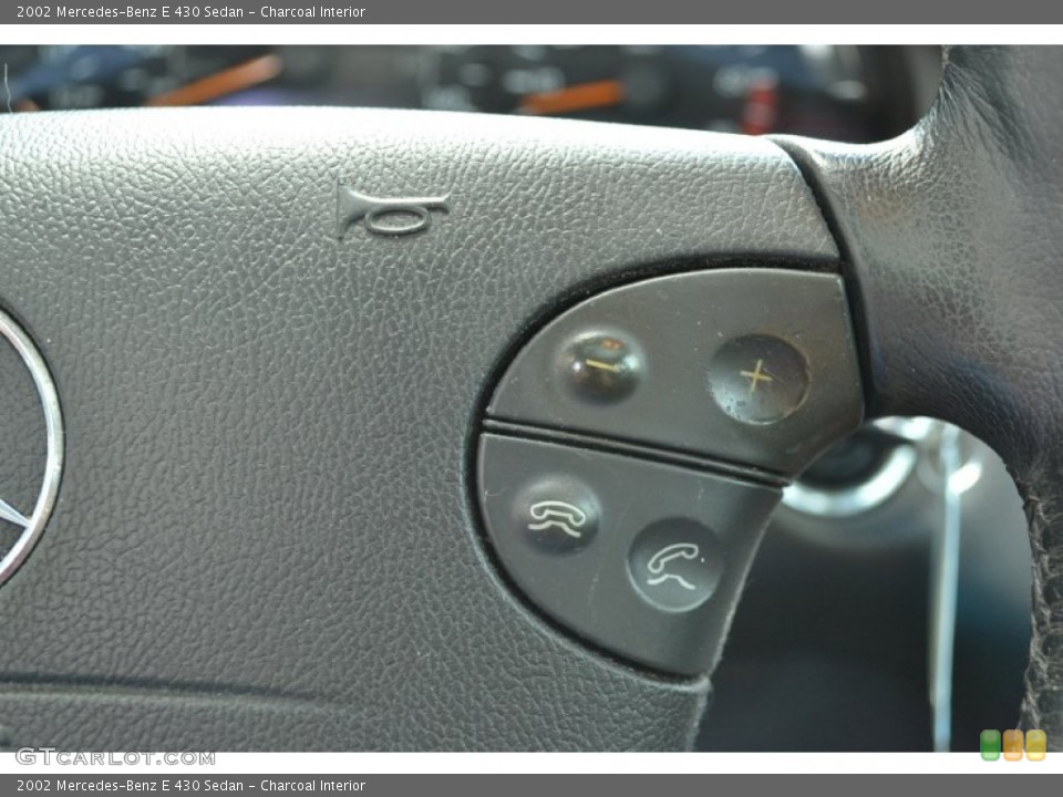 Charcoal Interior Controls for the 2002 Mercedes-Benz E 430 Sedan #79543416