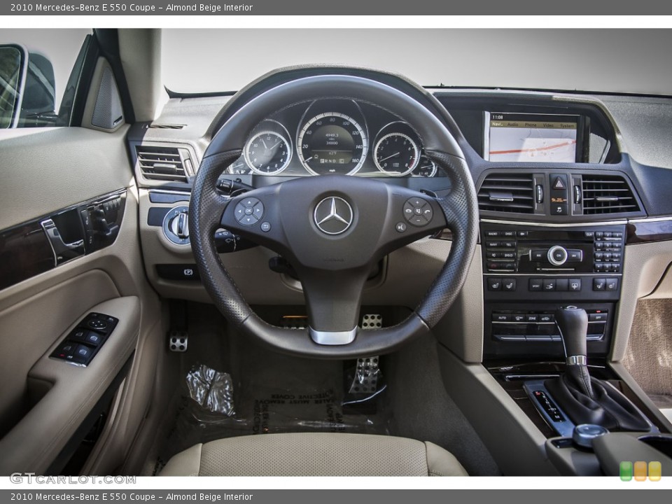Almond Beige Interior Dashboard for the 2010 Mercedes-Benz E 550 Coupe #79578977