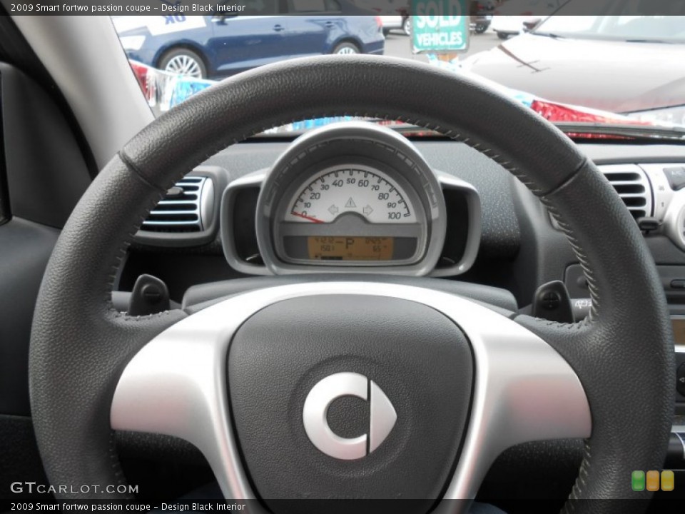 Design Black Interior Steering Wheel for the 2009 Smart fortwo passion coupe #79609372