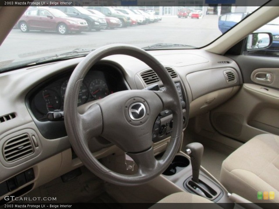 Beige Interior Dashboard for the 2003 Mazda Protege LX #79647683
