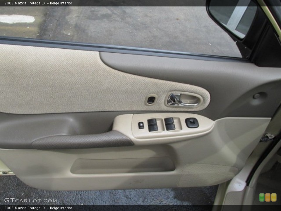 Beige Interior Door Panel for the 2003 Mazda Protege LX #79647718