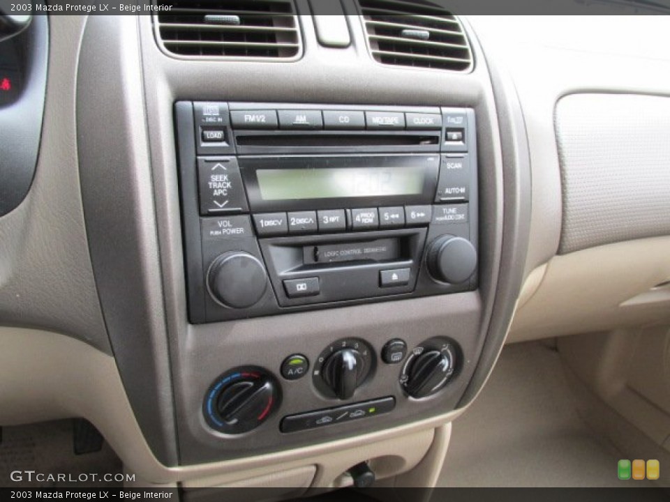 Beige Interior Controls for the 2003 Mazda Protege LX #79647761