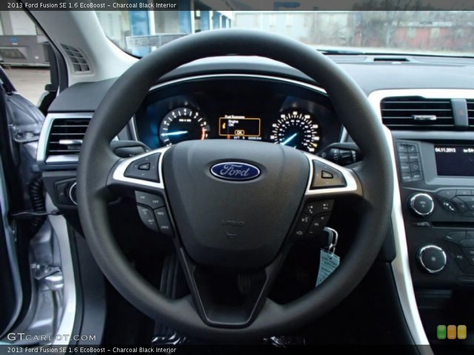 Charcoal Black Interior Steering Wheel for the 2013 Ford Fusion SE 1.6 EcoBoost #79648953